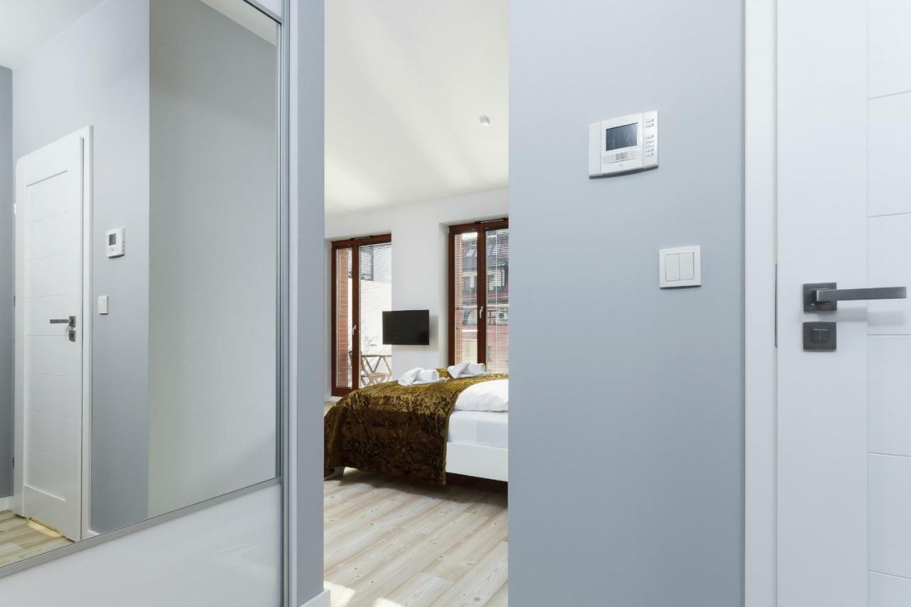 Apartments Harmonica Trynitarska By Noclegi Renters Cracovie Extérieur photo