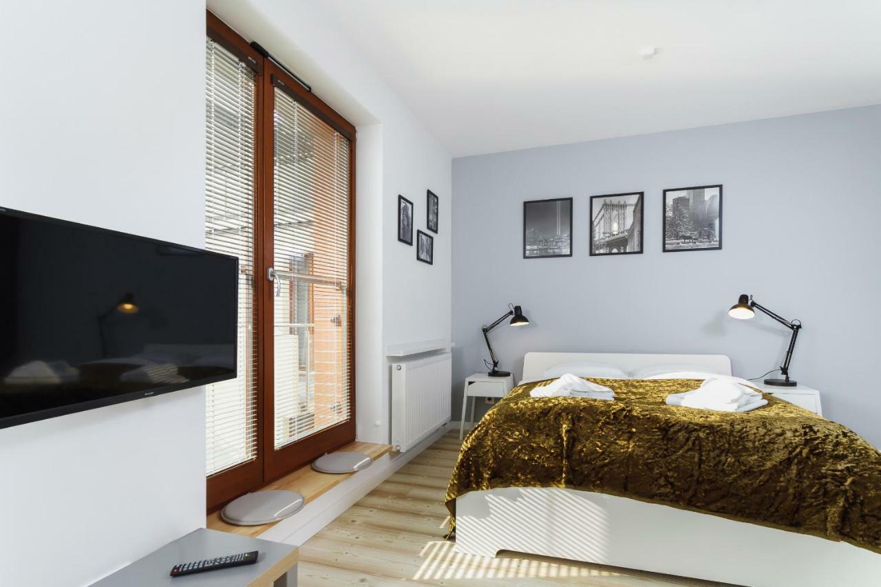 Apartments Harmonica Trynitarska By Noclegi Renters Cracovie Extérieur photo